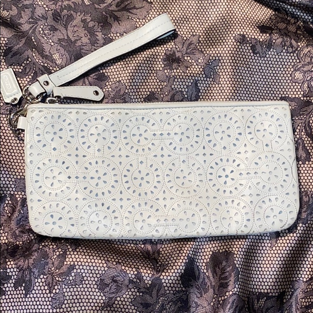 NWT Coach white perforated clutch